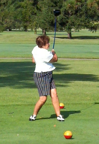 Marilyn Hubert gets great extension and puts all she has into it on her drive on #12.&nbsp; Nice swing Norma! 